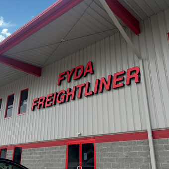 Go to fydafreightliner.com (map-and-hours-for-our-dealership--hours-walton subpage)